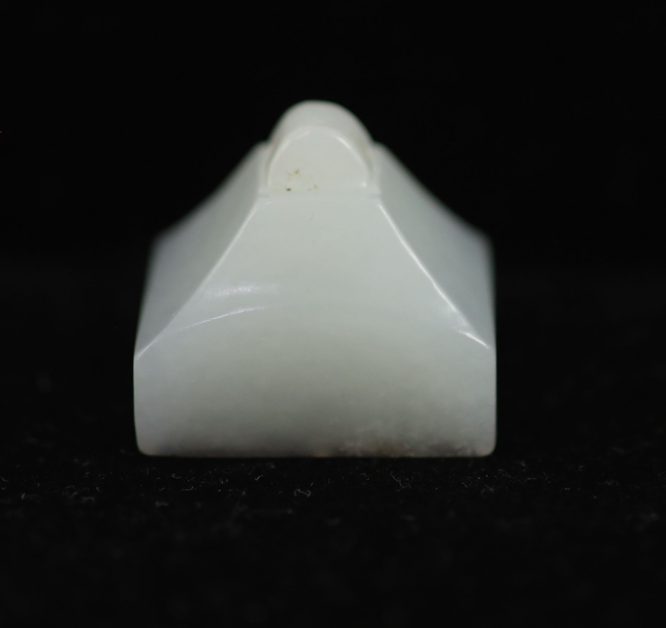 A Chinese white jade rectangular seal, 2.6 cm wide